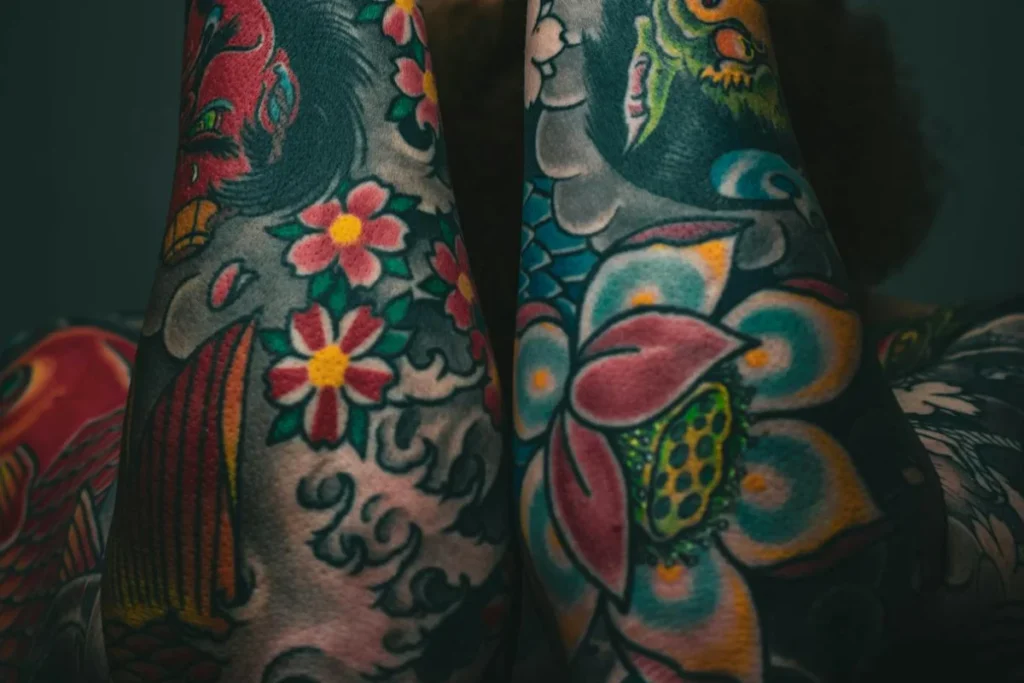 Arms with color tattoos
