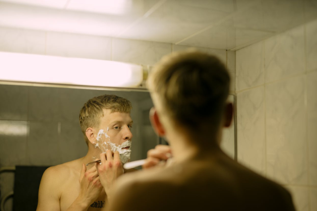A man's shaving routine