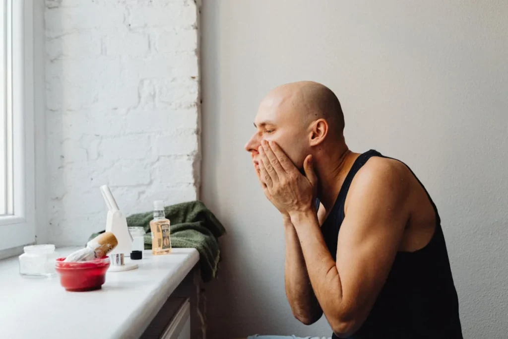Man shaving his beard