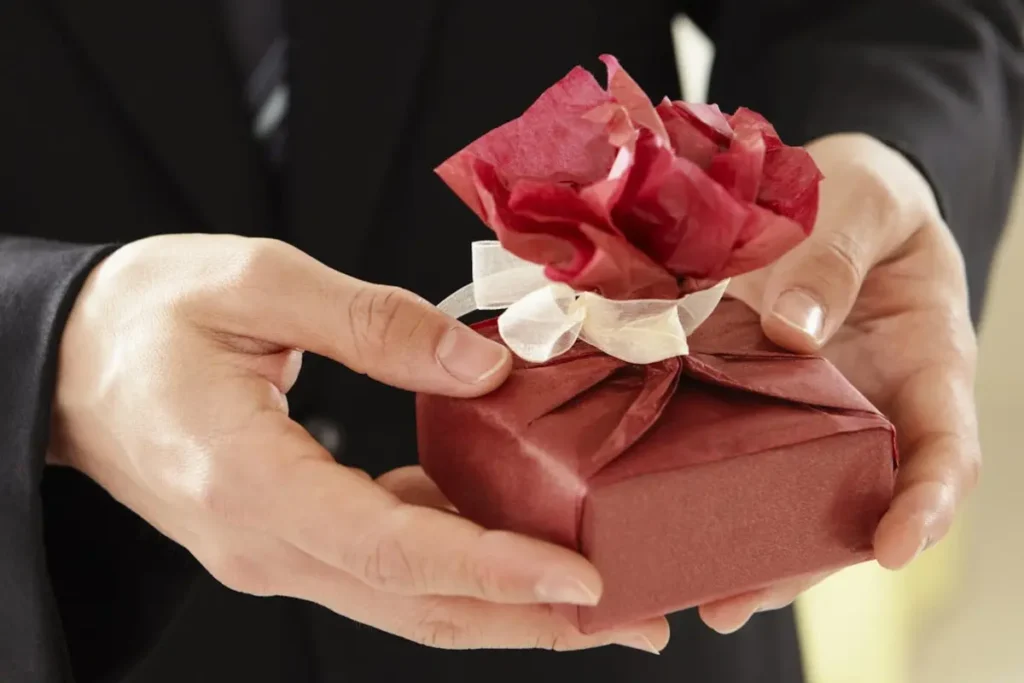 the hands of a man with a gift