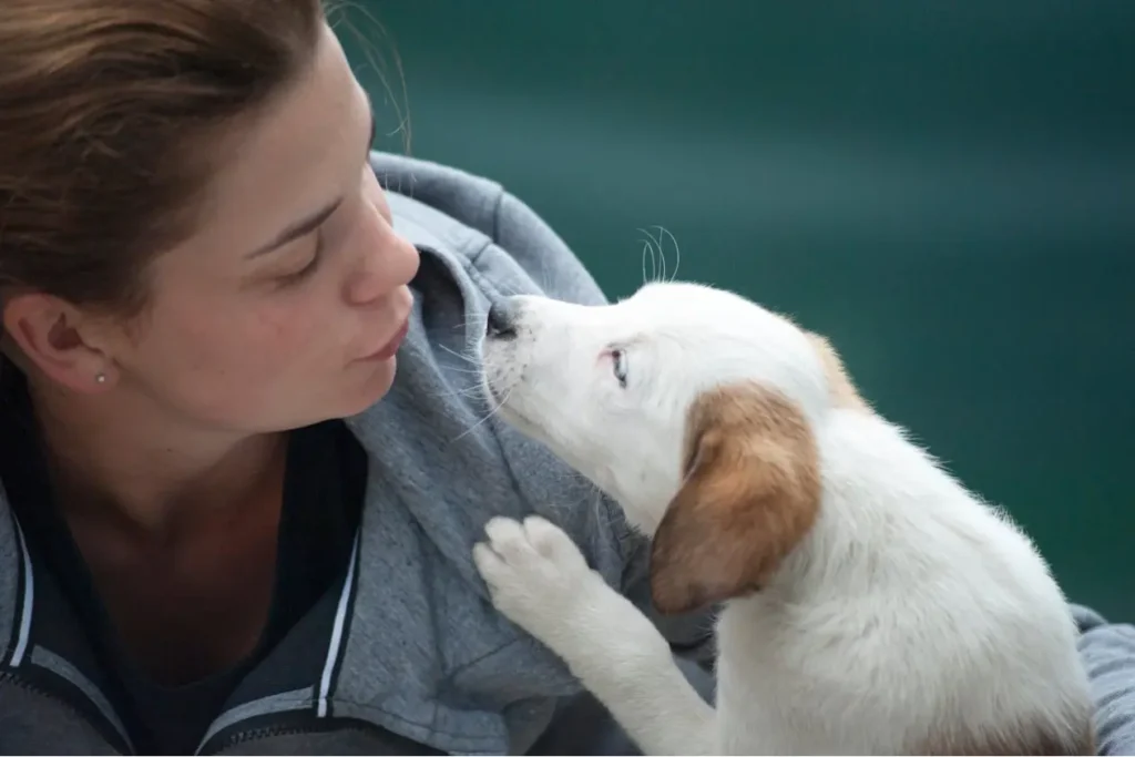 a woman with a dog