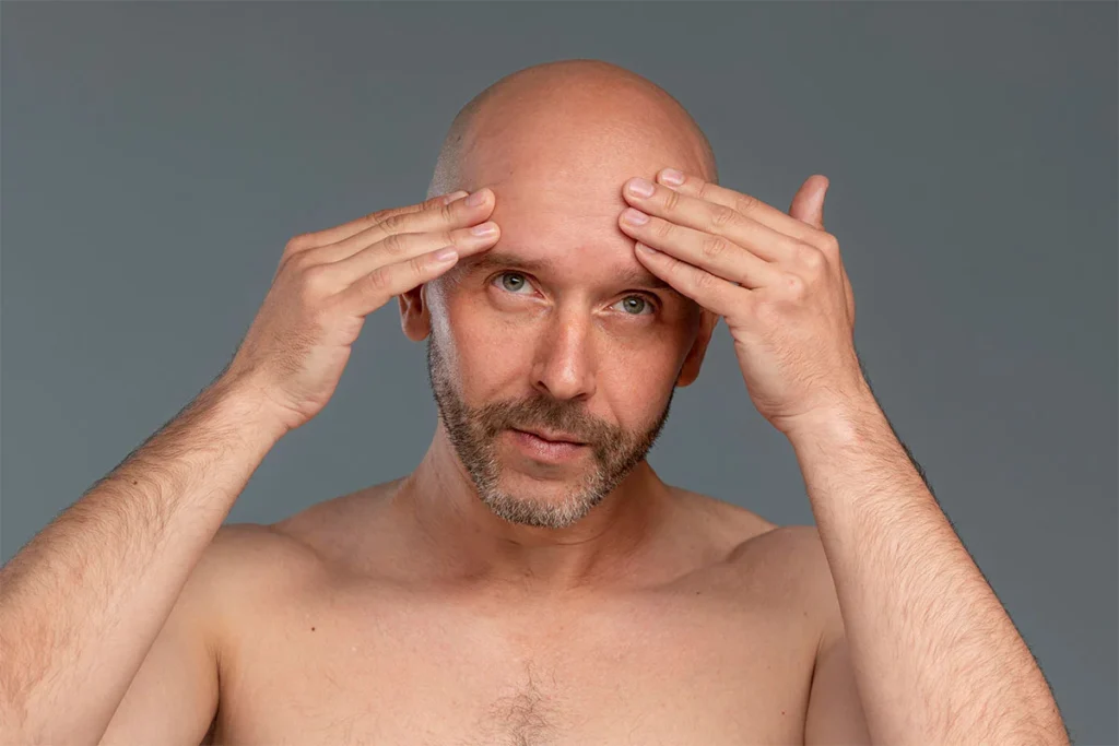 a man doing his scalp care routine