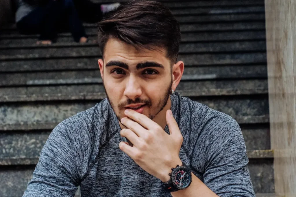 a young man with a short beard