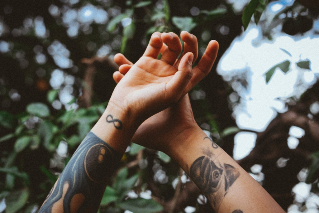 arms of a tattooed person